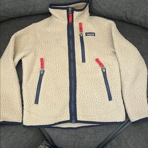 Patagonia Cream Sherpa Jacket with Blue and Red Details